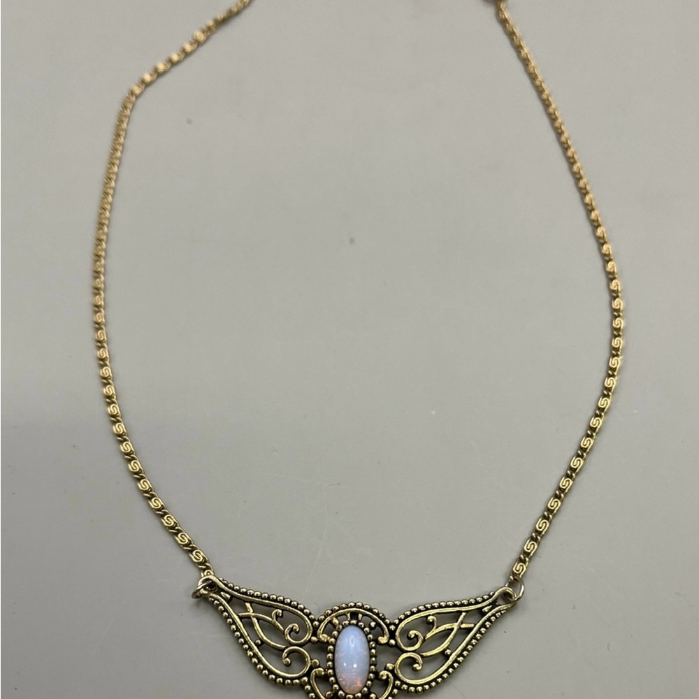 Gold Winged Necklace with White Gemstone - Picture 2 of 3